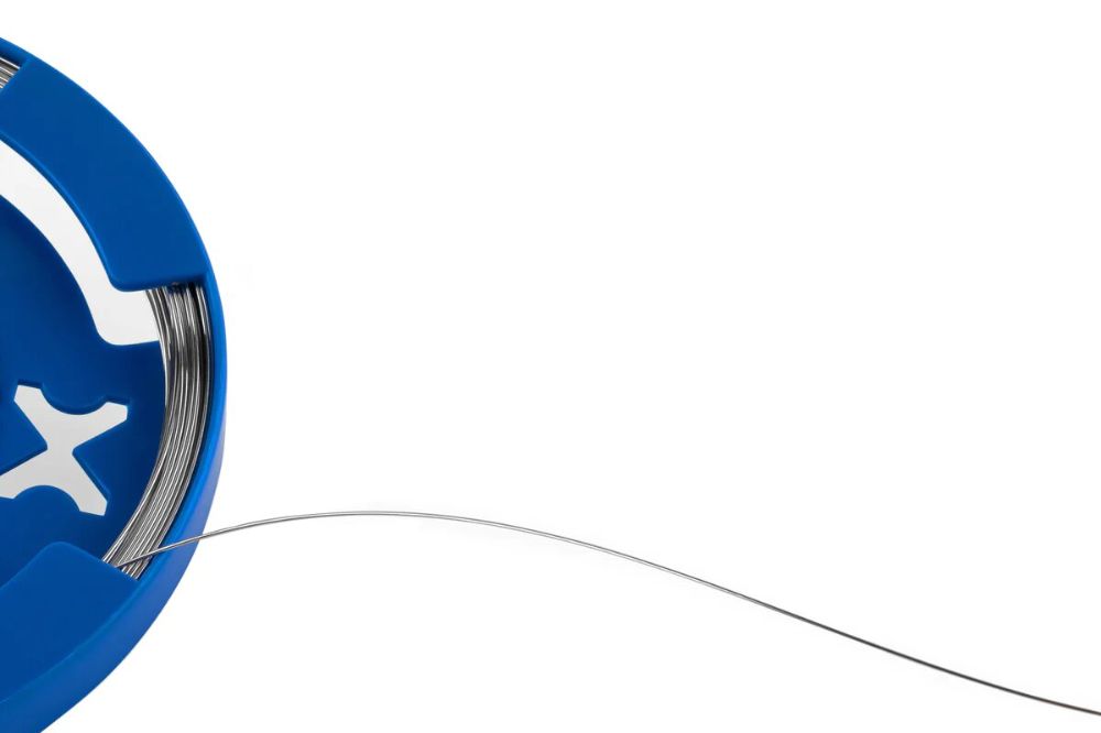 ALAMBRE EN ROLLO DURO ELASTICO .014 C/50 GR